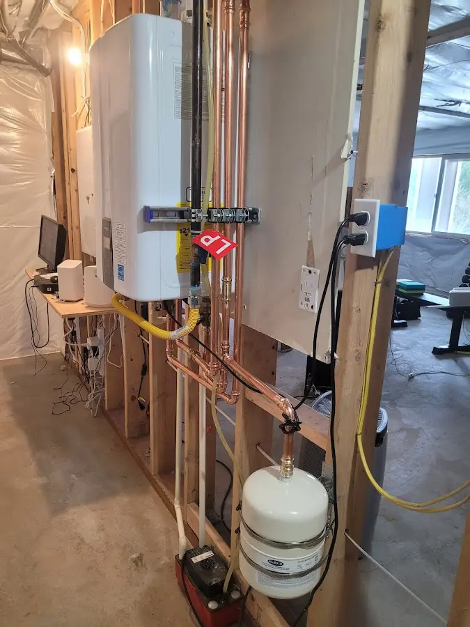 Licensed plumber repairing a kitchen sink in Reno